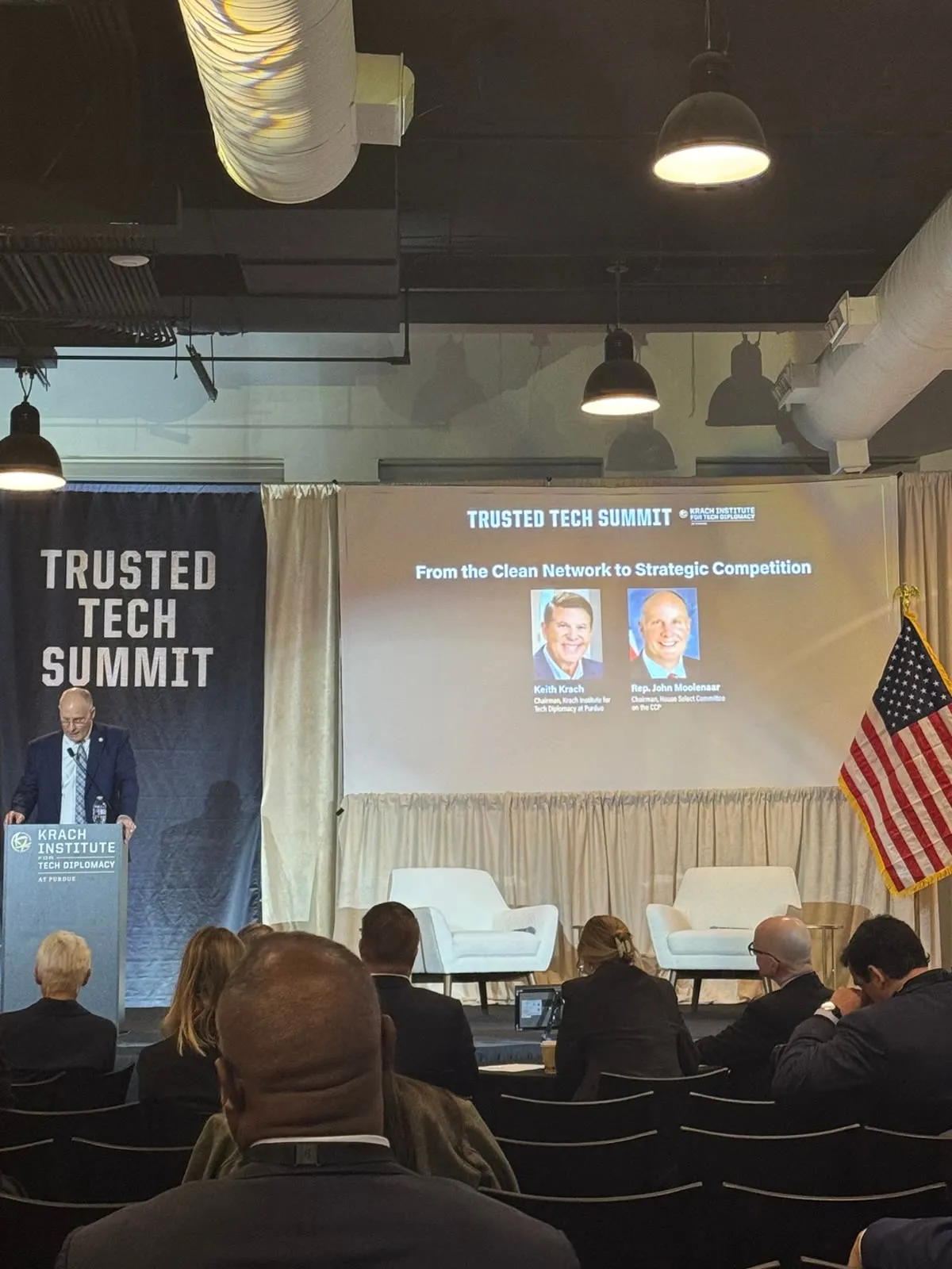 A Trusted Tech Summit fireside session on a Krach Institute stage.